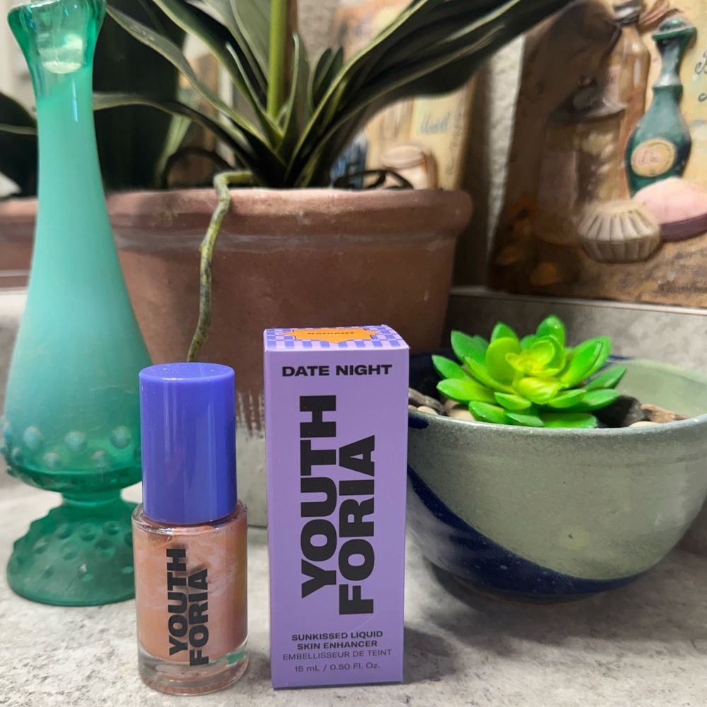 Youth Foria in RADIANT Sun-kissed Skin Enhancer Liquid highlighter